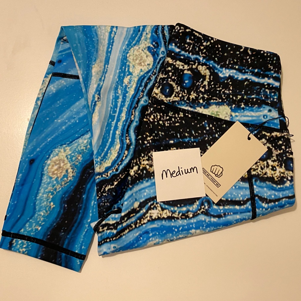 Feed Me Fight Me leggings - Med - NWT
